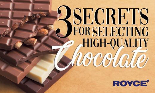 Stacked dark, milk, and white chocolate bars with almonds, overlayed with the headline “3 Secrets for Selecting High-Quality Chocolate” and Royce’ logo.