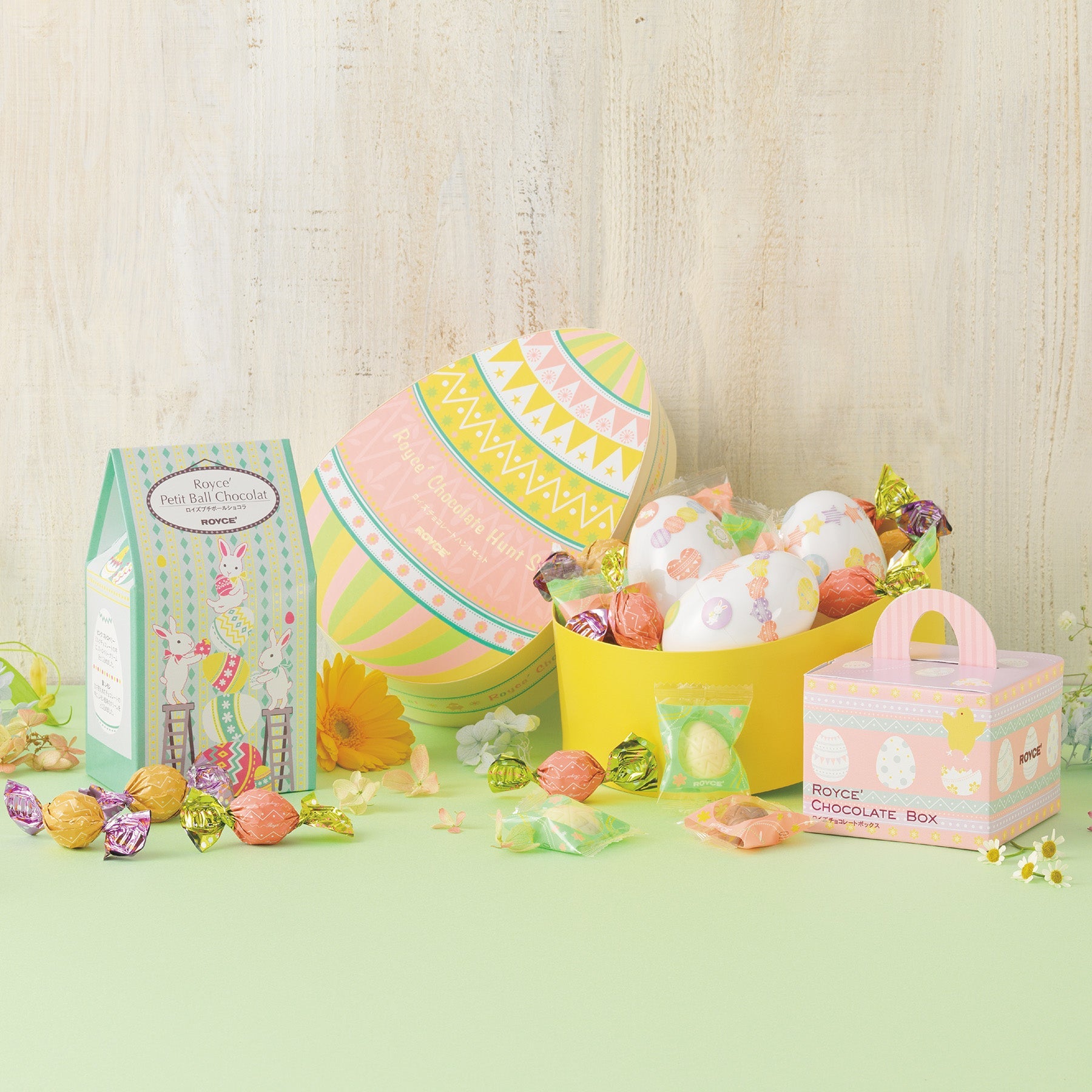 ROYCE' Chocolate - Image shows a group photo of Easter-themed chocolate boxes with loose chocolates and eggs for accents.