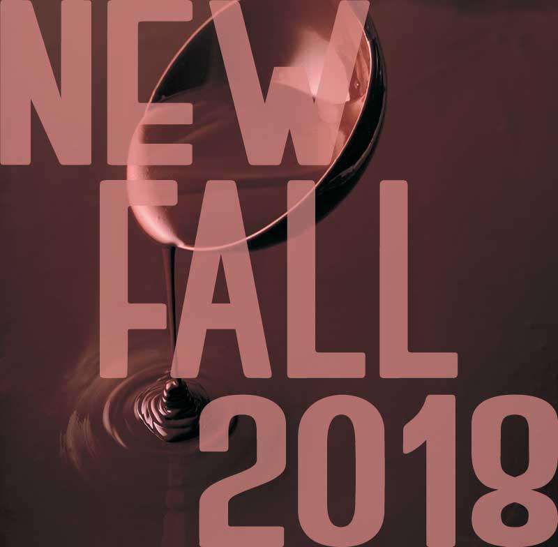 Spoon pouring thick chocolate liquid with ripples, overlaid with “NEW FALL 2018” text in large, semi-transparent letters, in warm, reddish tones.