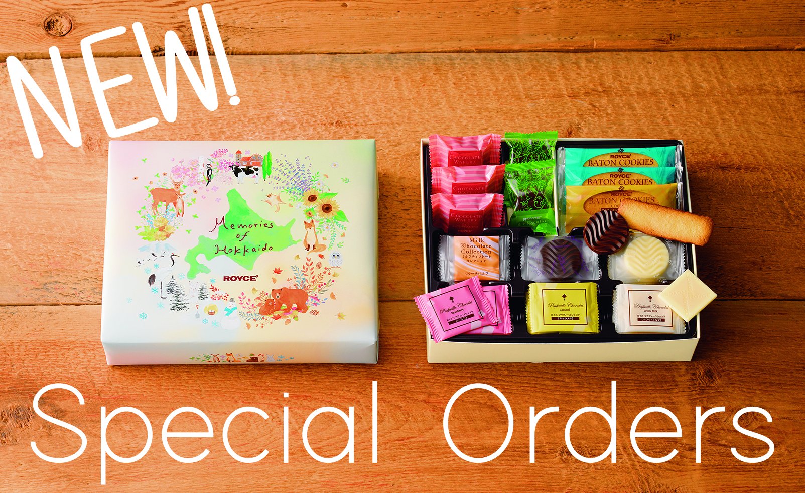 Gift box Memories of Hokkaido with pastel map design, opened to display assorted chocolates, wafers, cookies, and pralines. Text: NEW! Special Orders.