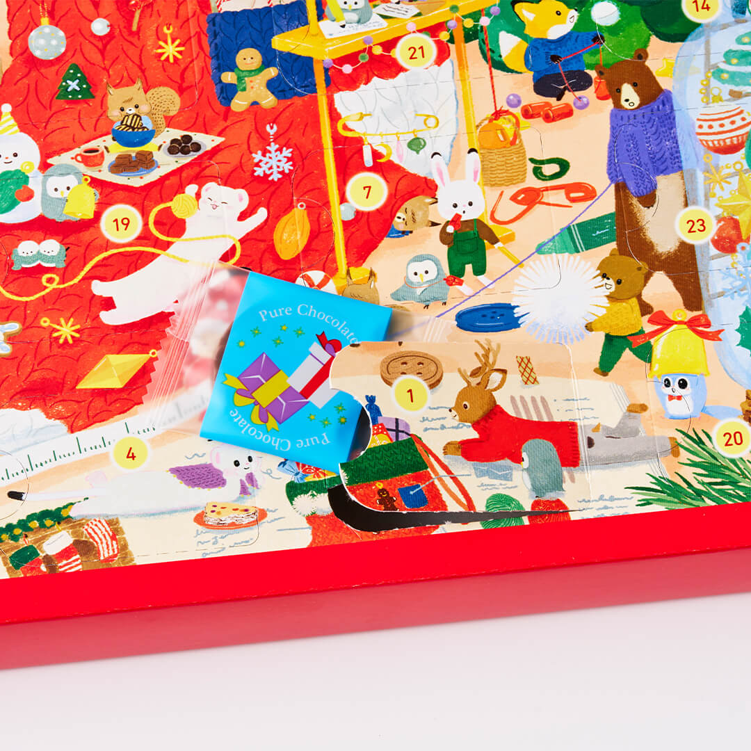 ROYCE' Chocolate - Advent Calendar - Image shows illustrations of animals and a chocolate disc wrapped with holiday-themed packaging.