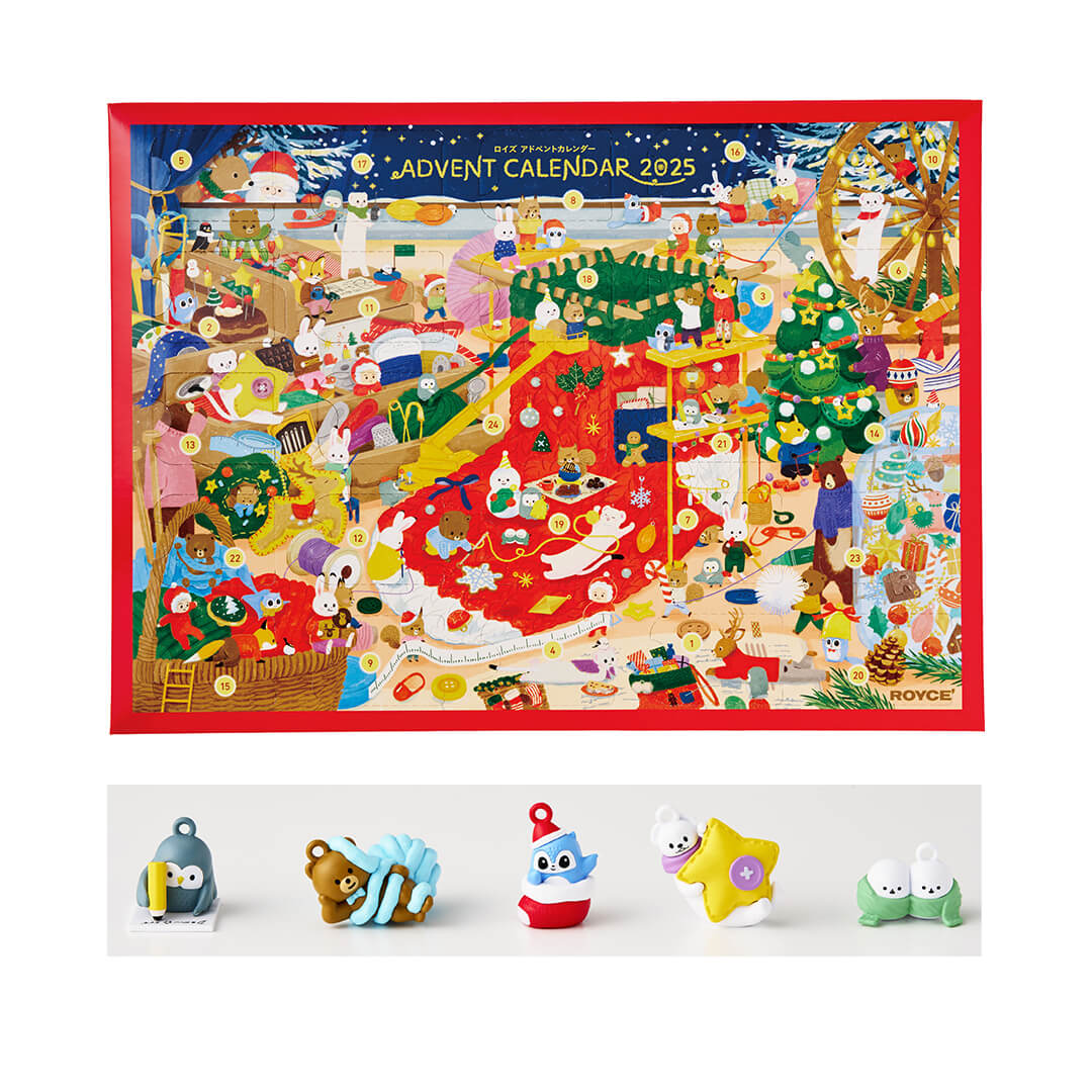 ROYCE' Chocolate - Advent Calendar - Image shows an Advent Calendar box with illustrations of animals and elves working on big socks in a holiday factory. Text says Advent Calendar 2025. Image also shows cute animal charms. Background is in white.