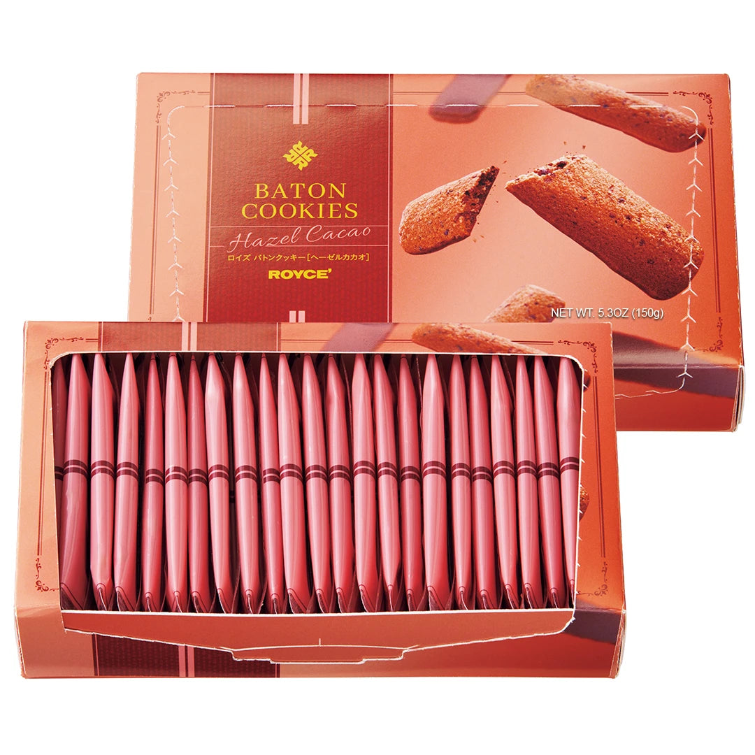 Baton Cookies Hazel Cacao featuring a red box with pictures of cookies and with text saying Baton Cookies Hazel Cacao ROYCE' Net Wt 5.3oz (150g). Also seen is an open box with individually-wrapped cookies with red packaging.