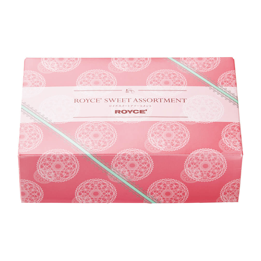 ROYCE' Chocolate - ROYCE' Sweet Assortment (17 Pcs) - Image shows a pink box with lace-like and ribbon-like prints in white and green. Text in the middle says ROYCE' Sweet Assortment ROYCE'.