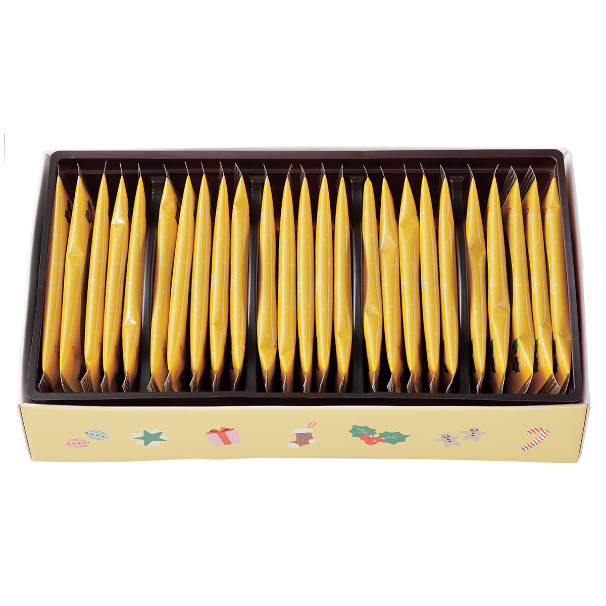 Image shows an open box with individually-wrapped cookies in yellow wrapping. Illustrations on bottom part include printed balls, a star, a gift box, a sock, a mistletoe, gingerbread men, and a candy cane.