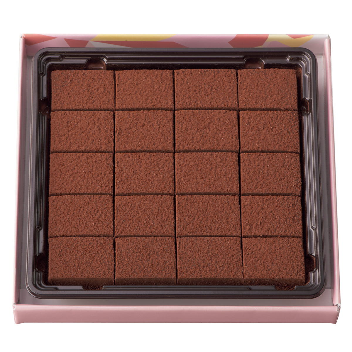 Nama Chocolate Strawberry Champagne: A tray of 20 bite-sized milk chocolate squares, dusted with cocoa powder, offering strawberry and champagne flavors. Exclusively in-store.