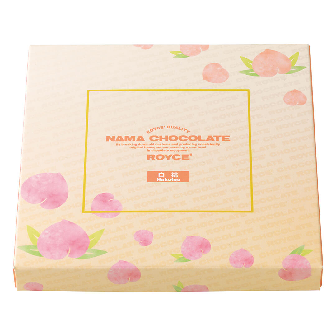 ROYCE' Chocolate - Nama Chocolate "Hakutou" - Image shows a peach-colored box with illustrations of peaches. Text inside yellow square says ROYCE' Quality Nama Chocolate By breaking down old customs and producing consistently original items, we are pursuing a new level in chocolate enjoyment. ROYCE' Hakutou.