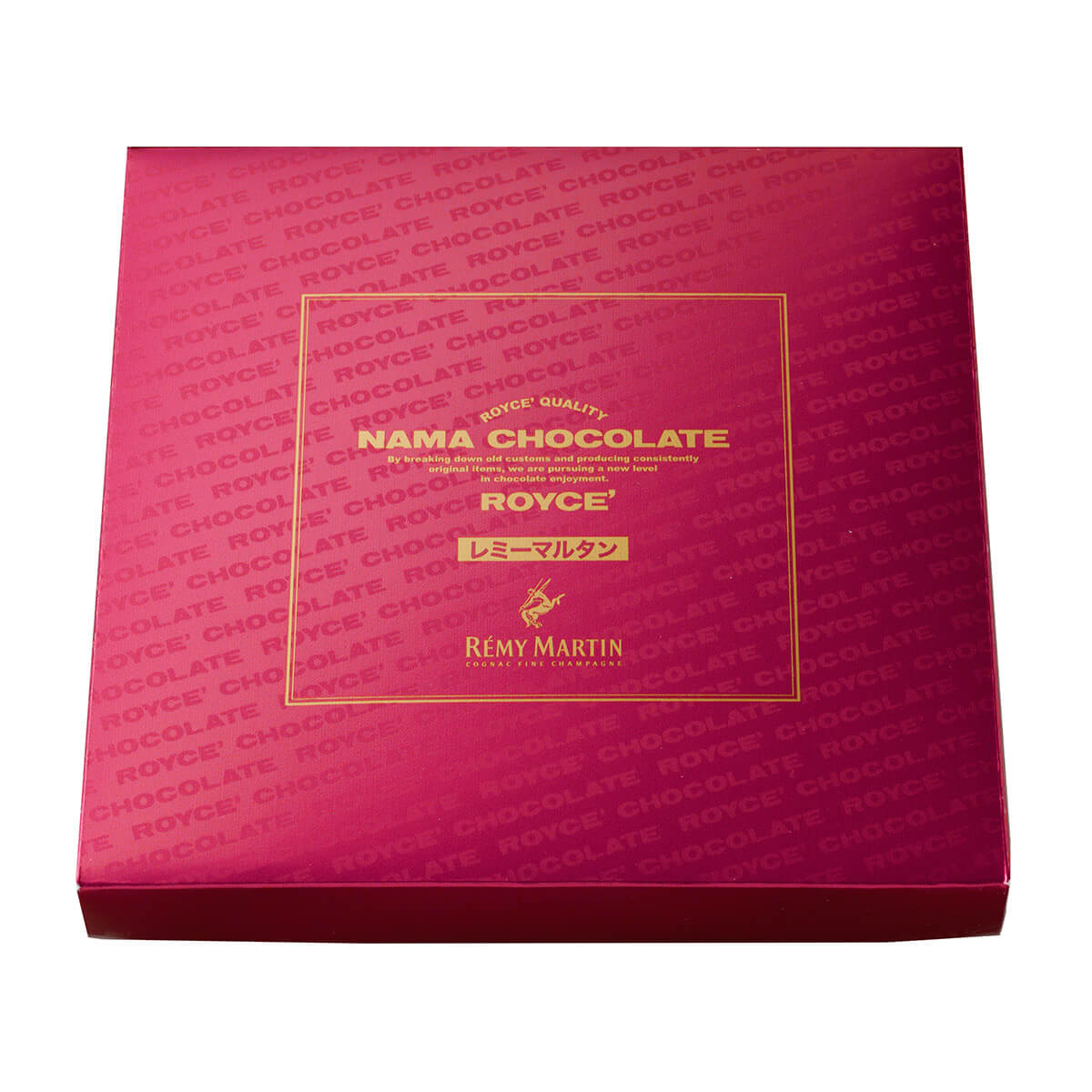 Image shows a red box with the words ROYCE' Chocolate printed. Gold square in the middle has gold text saying ROYCE' Quality Nama Chocolate By breaking down old customs and producing consistently original items, we are pursuing a new level in chocolate enjoyment. ROYCE' Remy Martin Cognac Fine Champagne.