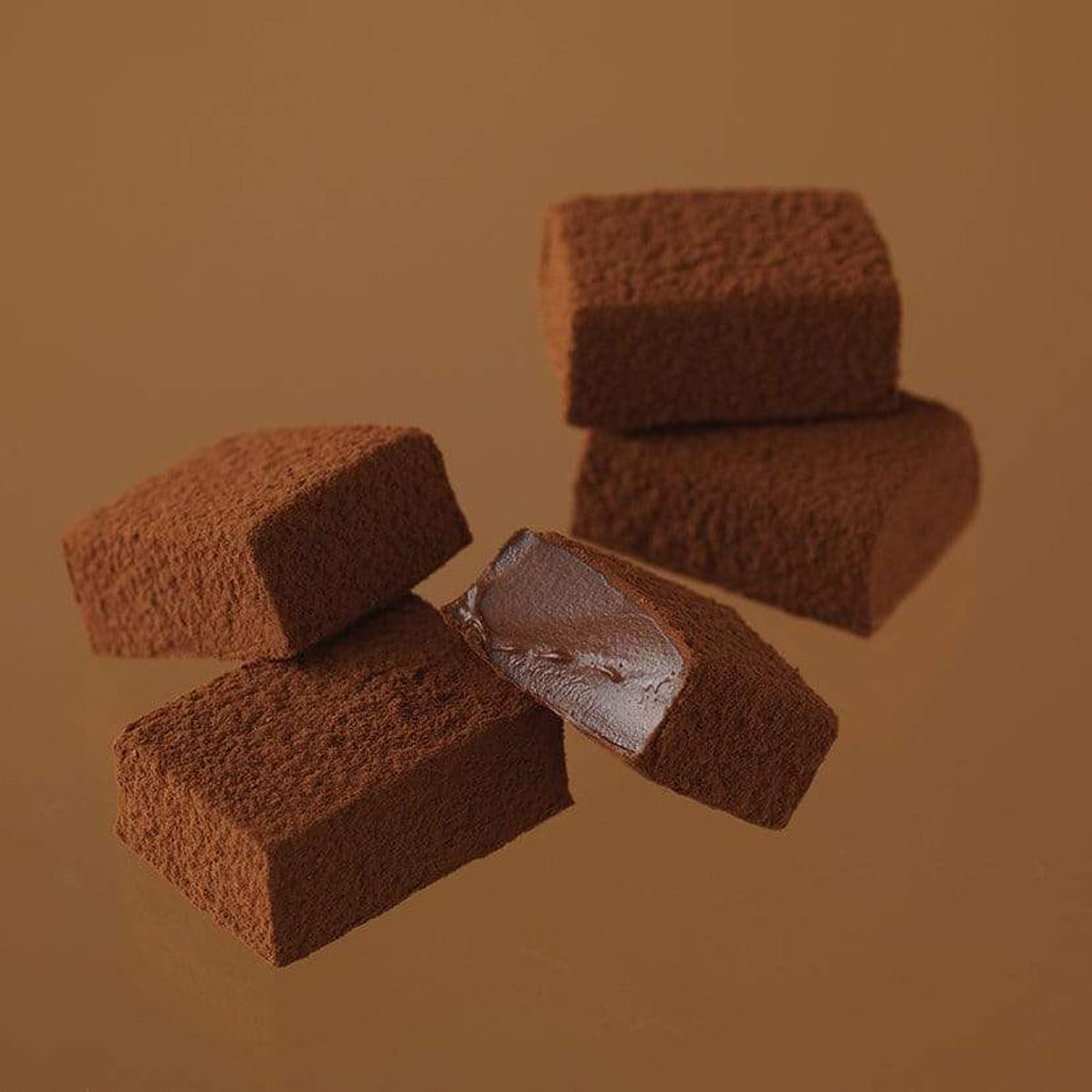 ROYCE' Chocolate - Nama Chocolate "Mild Cacao" - Image shows brown blocks of chocolates with a brown background.