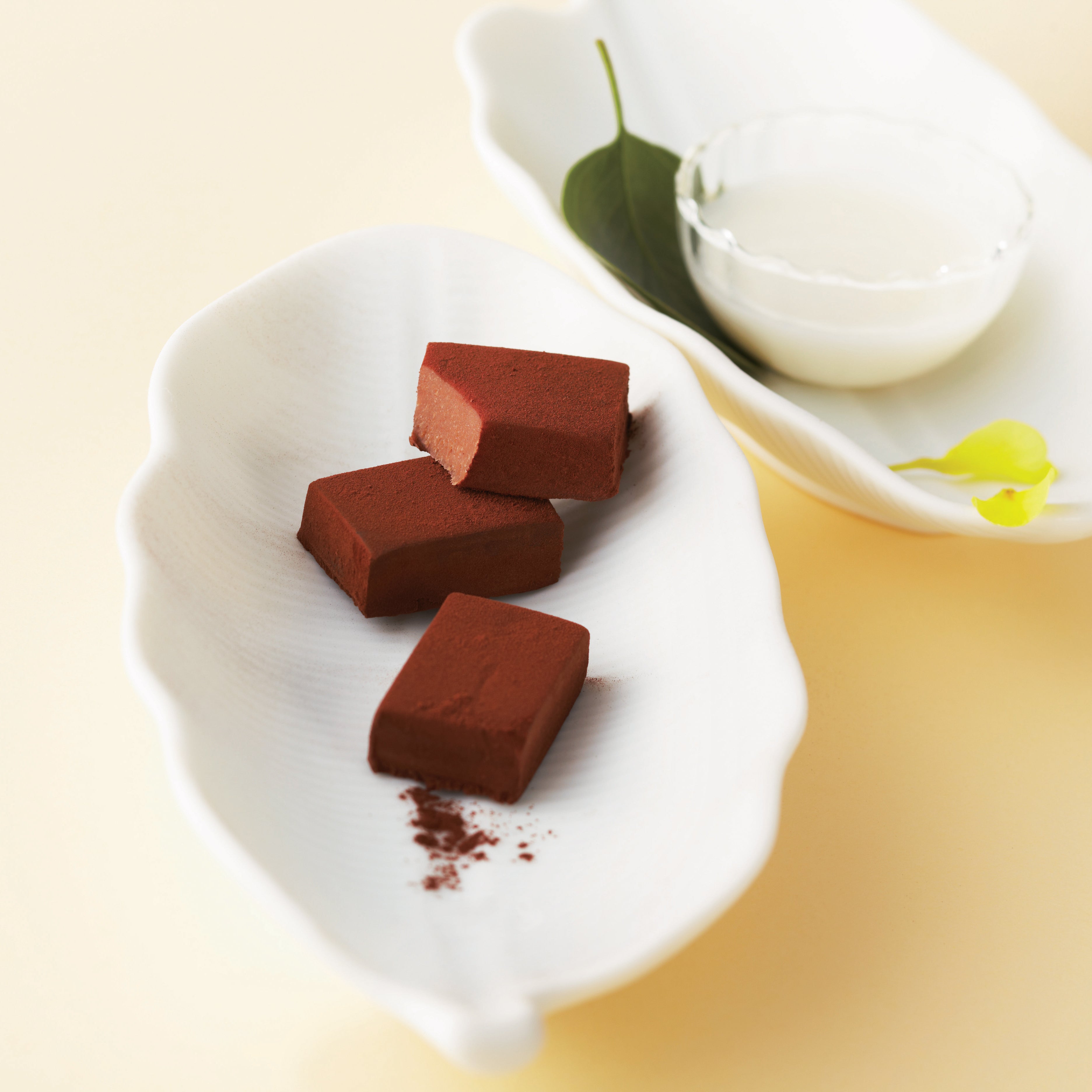 Image shows ROYCE' Nama Chocolate blocks on a plate.