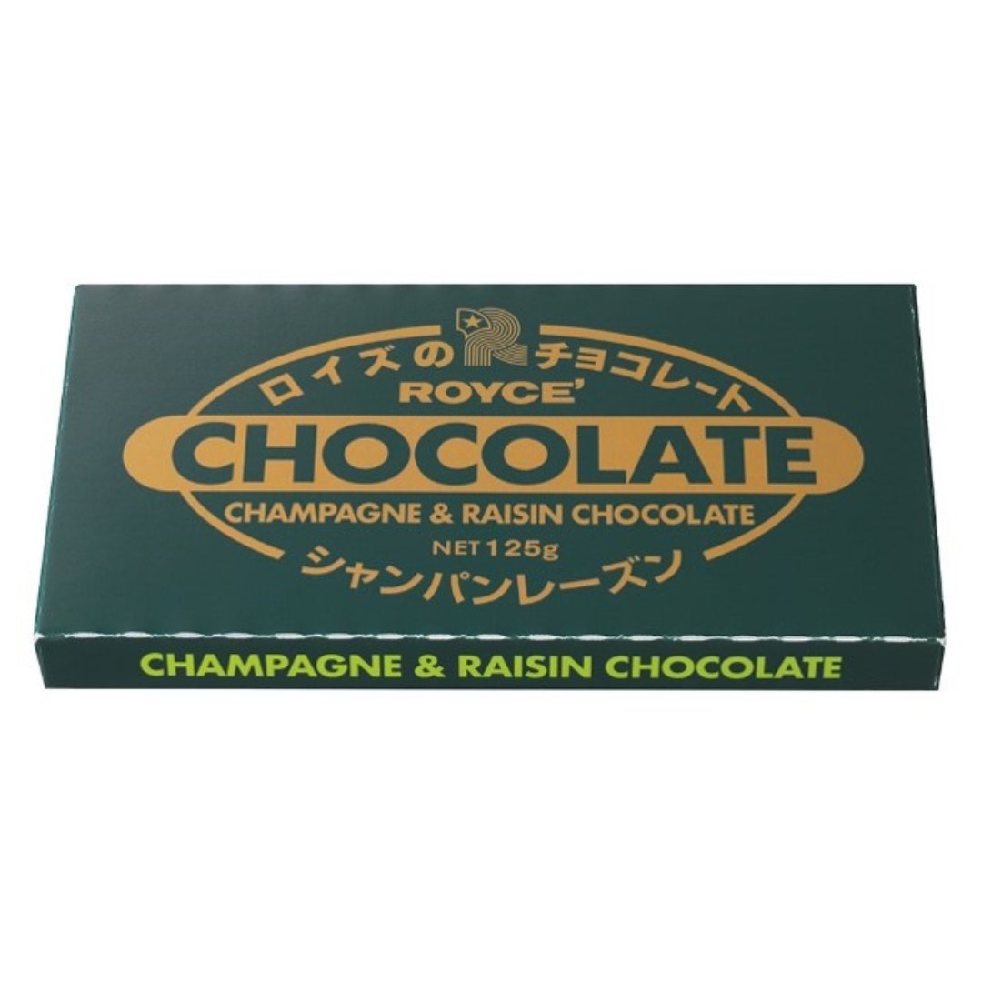 Image shows a green chocolate carton. Text in gold says ROYCE' Chocolate Champagne & Raisin Chocolate Net 125g. Text on bottom part in green says Champagne & Raisin Chocolate.