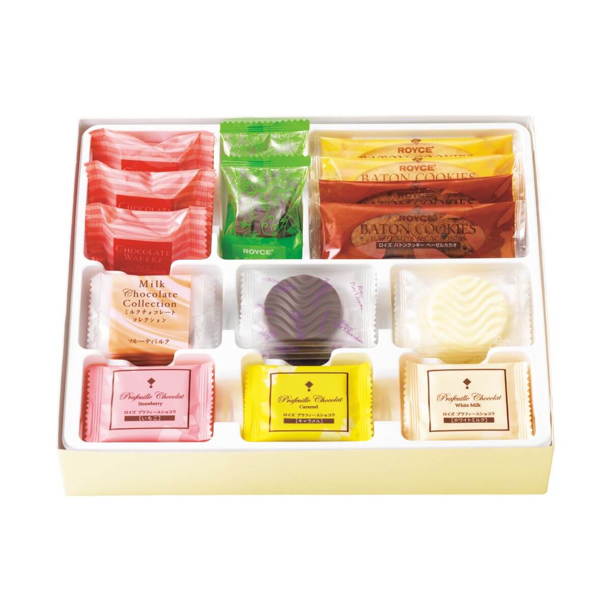 ROYCE' Chocolate - Chocolat No Shiki "Hokkaido" - Image shows an open box with a yellow lower front and individually-wrapped confections in different shapes and in the colors of pink, yellow, green, orange, brown, blue, and white. Visible text says Chocolate Wafers, ROYCE' Baton Cookies, Milk Chocolate Collection, Prafeuille Chocolat "Strawberry", Prafeuille Chocolat "Caramel", Prafeuille Chocolat "White Milk". Background is in white.