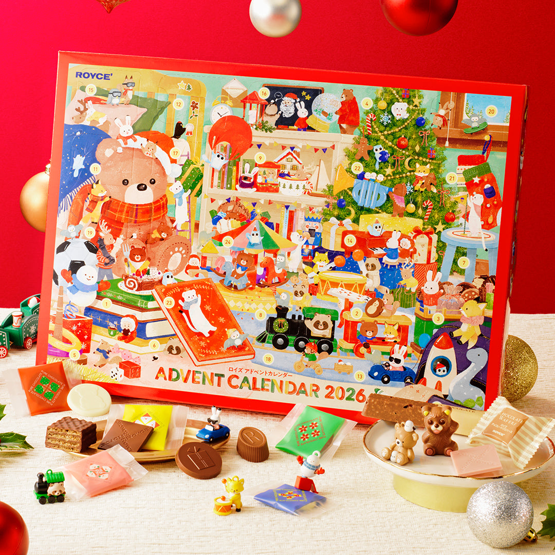 A colorful Advent Calendar by ROYCE' with a holiday-themed background and decor.