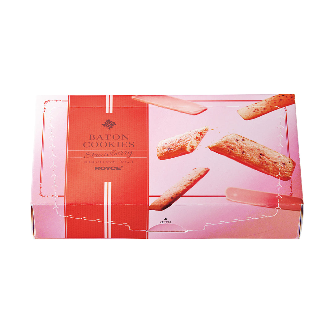 A pink and red box of ROYCE' Baton Cookies, strawberry flavor, shown on a plain white background. The packaging features illustrations of cookies and the brand name 'ROYCE' printed on the front.