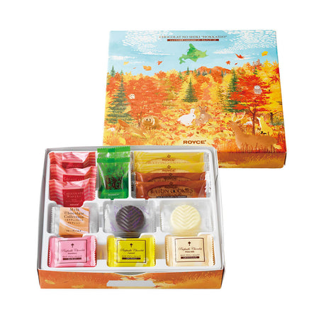 Chocolat No Shiki "Hokkaido" (Winter Package) - Image shows a printed box on upper right with illustrations of animals and a fall-themed landscape with trees. Lower left shows an open box with individually-wrapped confections inside.