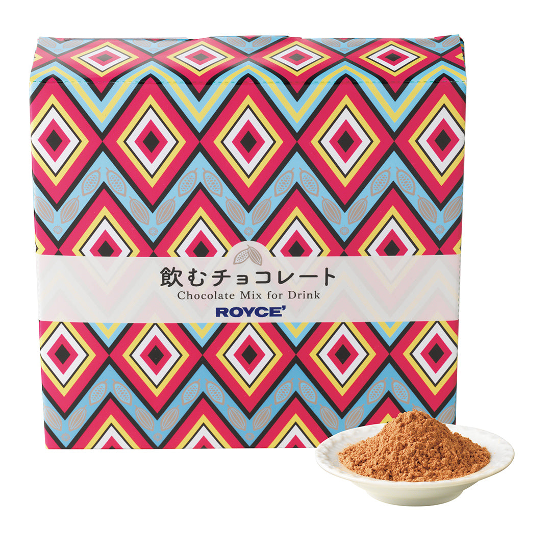 Image shows a printed box with text saying Chocolate Mix for Drink. Accent includes a white bowl with brown chocolate powder. Background is in white.