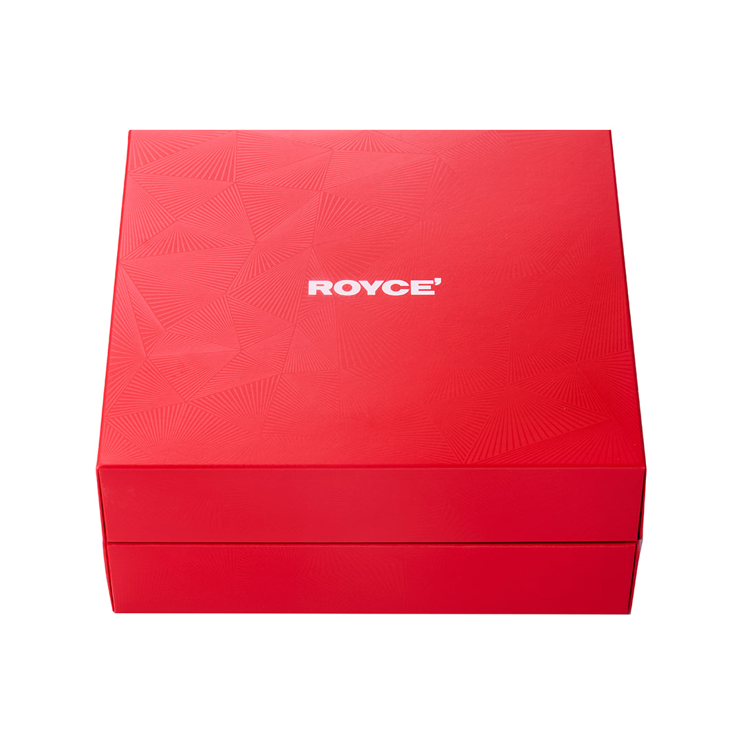 A square red product box with a subtle geometric pattern on the lid and the brand name 'ROYCE' printed in white in the center, shown on a plain white background.