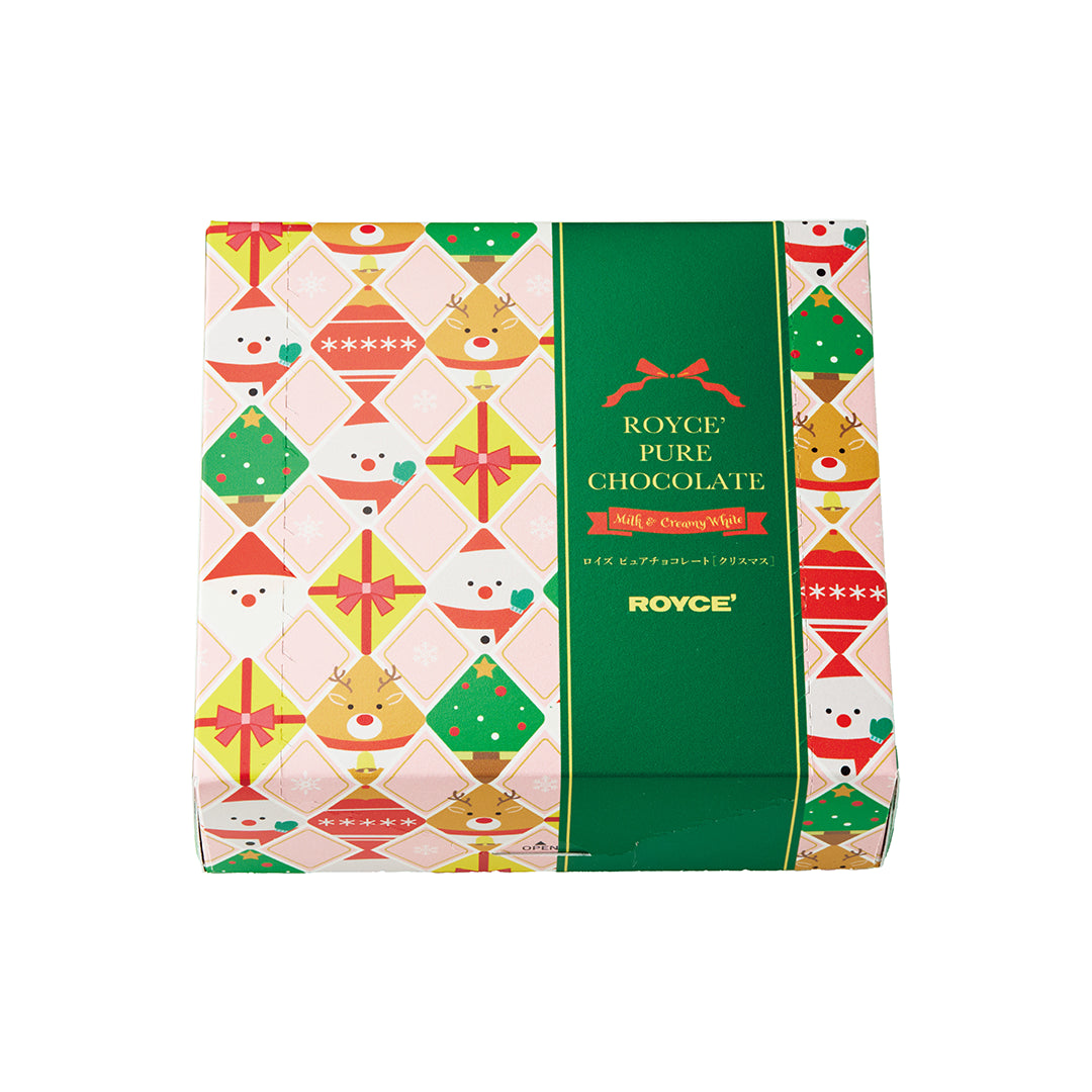 Festive box of Pure Chocolate Christmas with holiday motifs, featuring 20 Milk and 20 Creamy White chocolate discs, exclusive to select US boutiques.