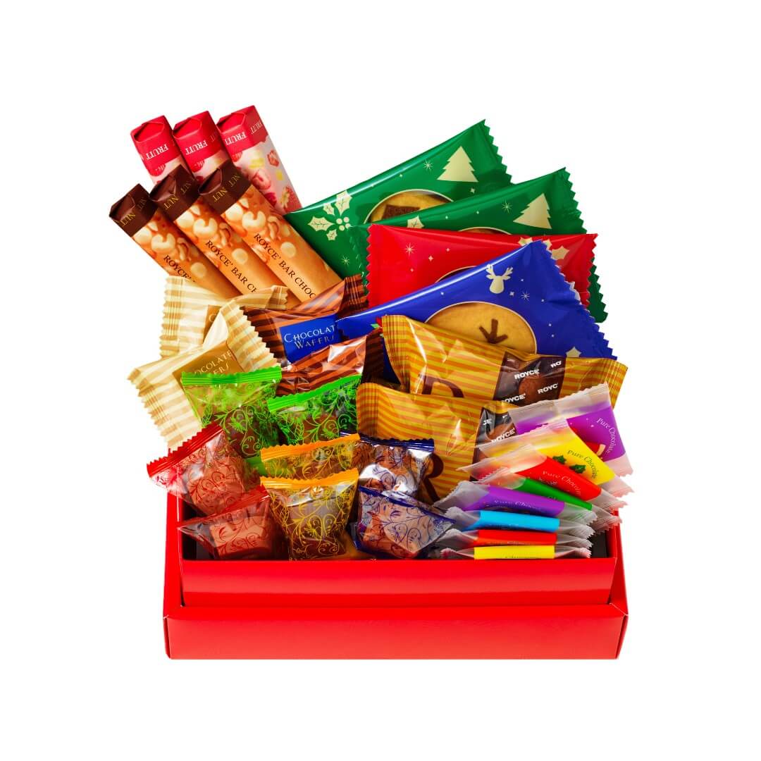 ROYCE' Holidays Selection (32 Pcs) - Image shows an open red box with individually-wrapped confections of varying sizes, shapes, and colors. Background is in white.