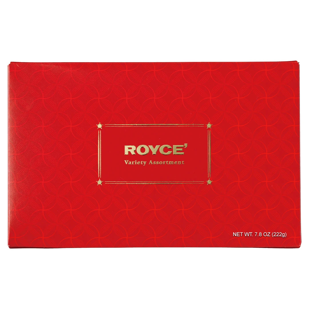 Red gift box of Royce’ Variety Assortment chocolates, featuring a cacao pod motif, containing 28 individually-wrapped pieces of bestselling chocolates.