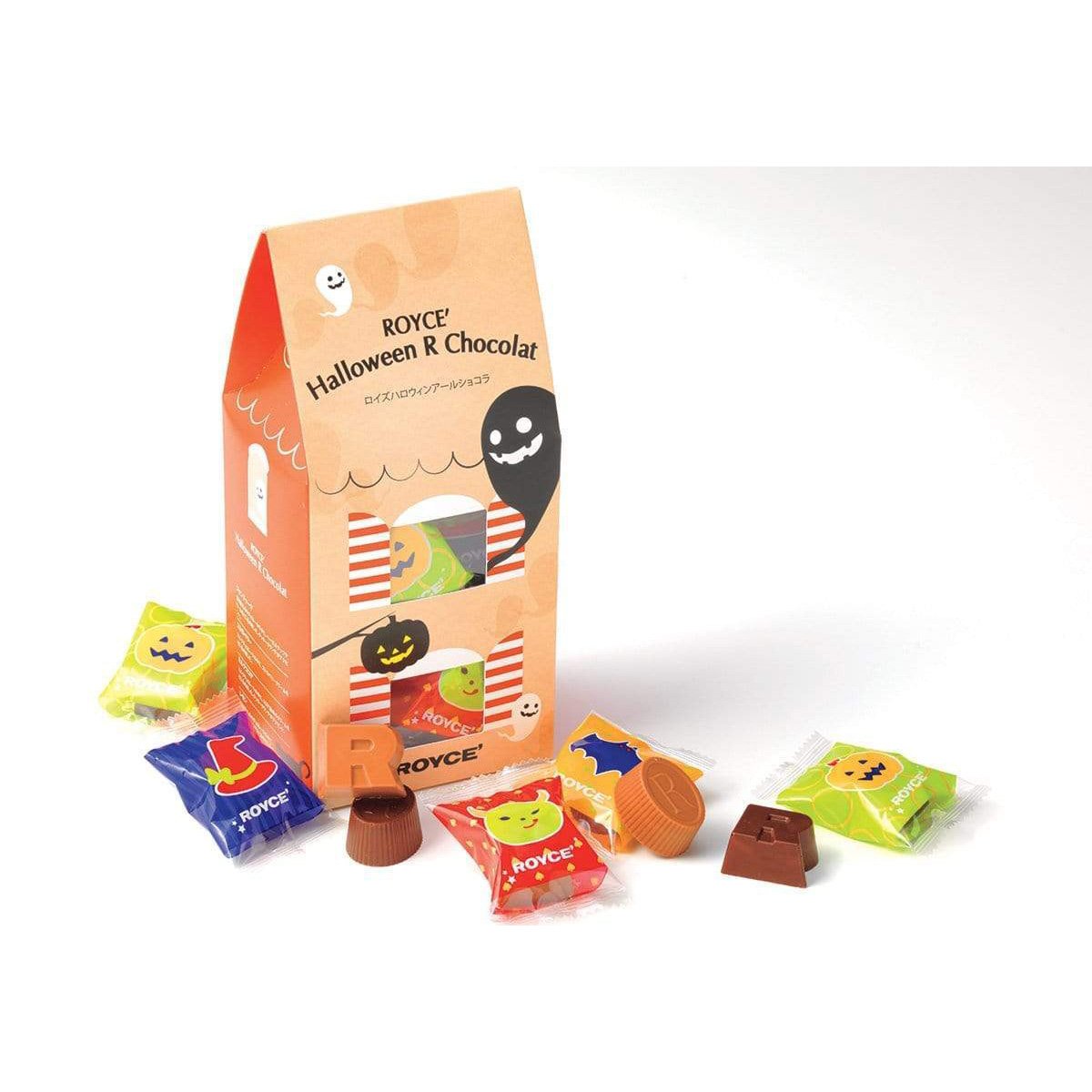 Image shows a box in orange and light brown colors with illustrations of ghosts and pumpkins. Text says ROYCE' Halloween R Chocolat ROYCE'. Accents include R-shaped and oval-shaped chocolates in hues of brown, candy wrappers in red, green, blue, and yellow with prints of pumpkins, ghouls, and a bat. Background is in white.