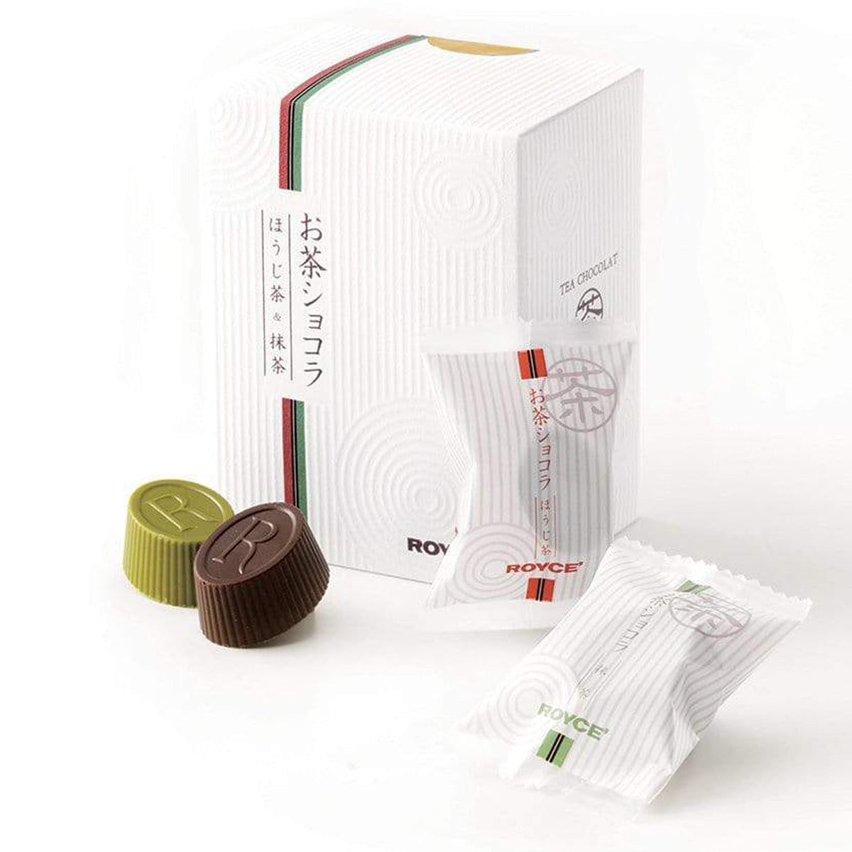 ROYCE' Chocolate - Tea Chocolat "Hojicha & Matcha" - Image shows a white box and packaged chocolates with accents of colors red and green. Visible words are Tea Chocolat and ROYCE'. On the left are green and brown chocolate cups engraved with the letter R.