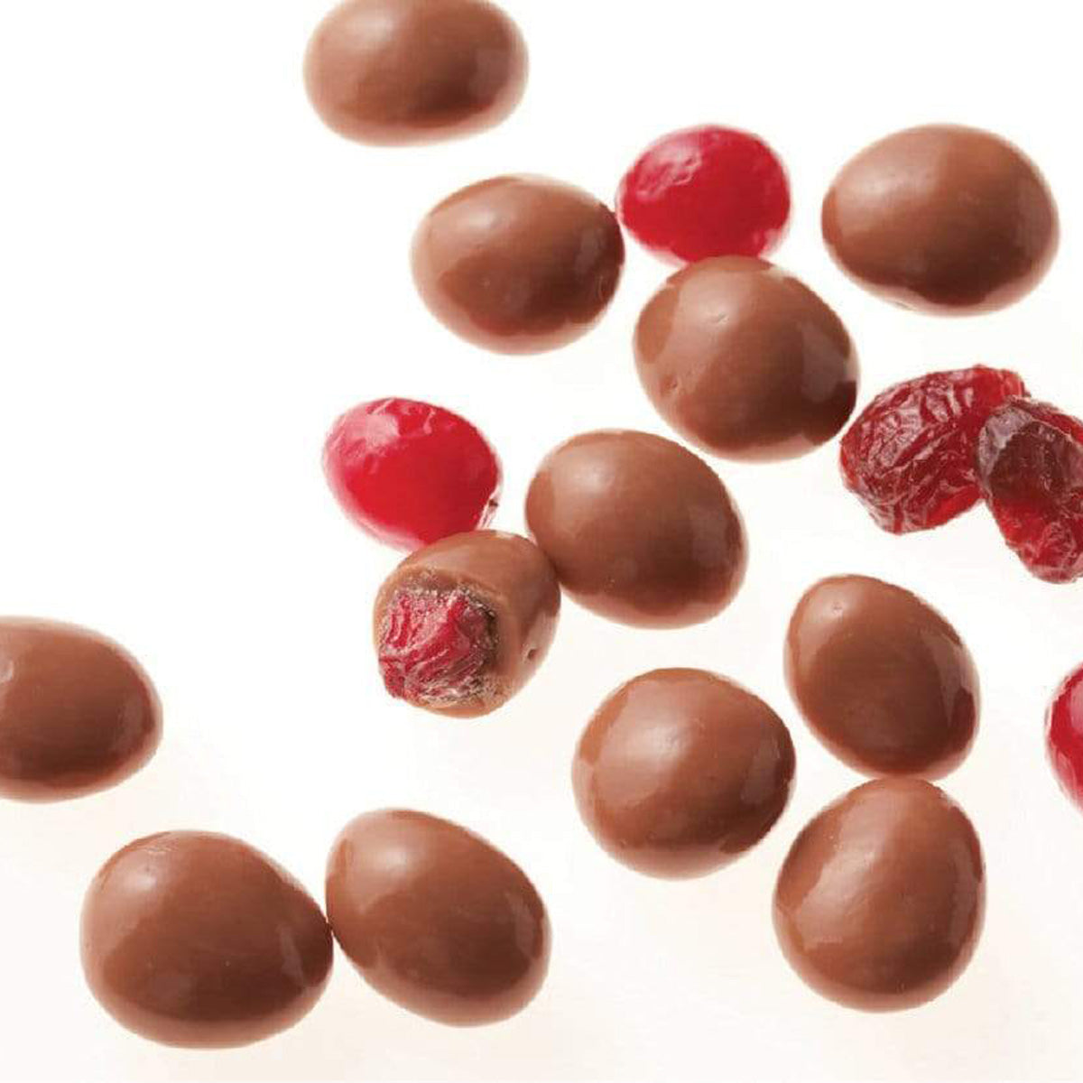 ROYCE' Chocolate - Cranberry Chocolate - Image shows round cranberry chocolates, a mix of brown and red colors. Background is in color white.