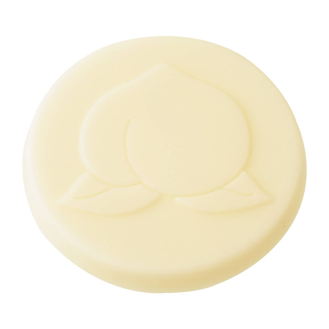 ROYCE' Chocolate - Hakutouberry & Hakutouwhite Chocolate - Image shows a white chocolate disc embossed with a peach-shaped pattern.