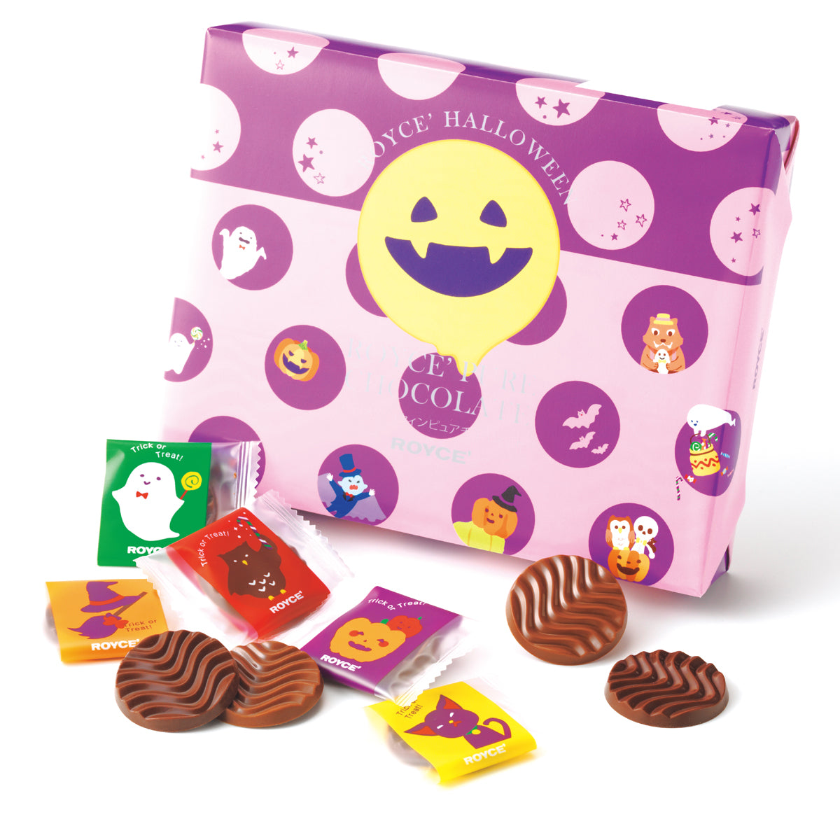 Image shows a purple and violet box with illustrations. Text on box says ROYCE' Halloween ROYCE' Pure Chocolate ROYCE'. Accents include chocolate discs and printed chocolate wrappers. Background is white.