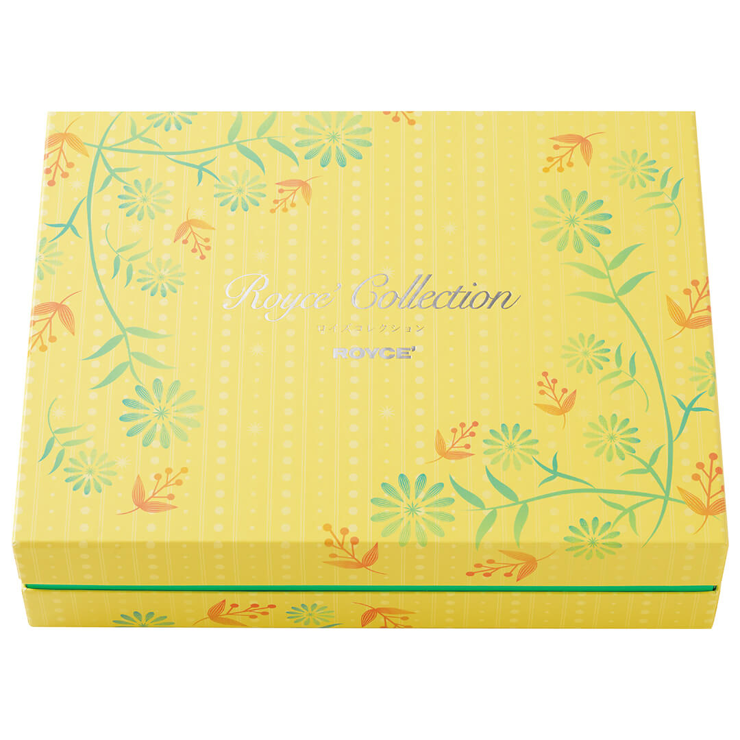 ROYCE' Chocolate - ROYCE' Collection "Sweet Yellow" - Image shows a yellow box with green trimmings and floral prints in yellow and green. Text in the middle says ROYCE' Collection ROYCE'. Background is in color white.