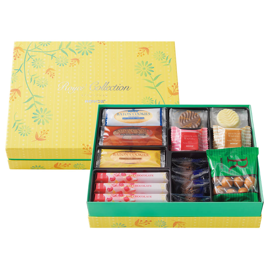 ROYCE' Chocolate - ROYCE' Collection "Sweet Yellow" - Image shows a yellow box on upper left with green trimmings and floral prints in yellow and green. Text in the middle says ROYCE' Collection ROYCE'. Box below is in green with yellow trimmings and filled with wrapped confections in the colors blue, white, pink, brown, and green of varying hues and shapes. Background is in color white.