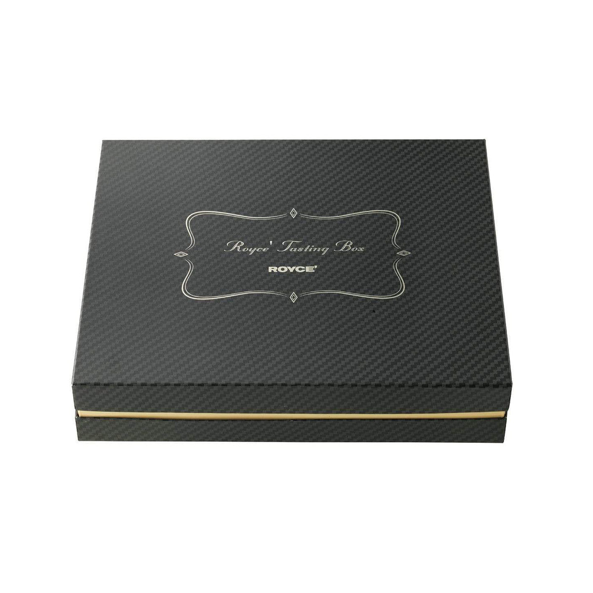ROYCE' Chocolate - ROYCE' Tasting Box - Image shows a black box. Text in center says ROYCE' Tasting Box ROYCE'.
