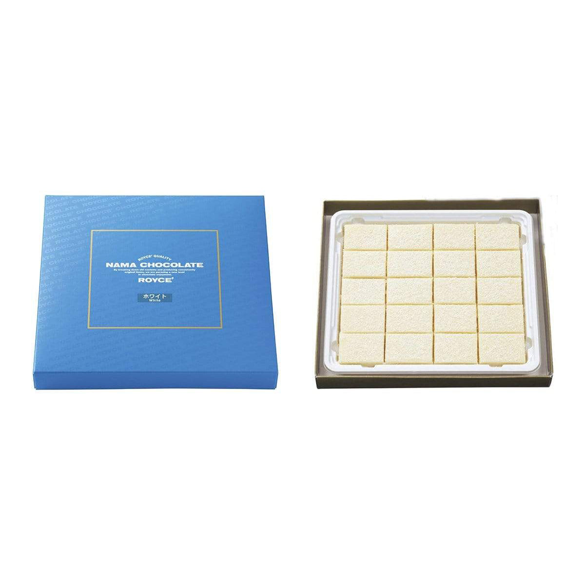 ROYCE' Chocolate - Nama Chocolate "White" - Image shows a blue box on left with white text inside golden square saying ROYCE' Quality Nama Chocolate By breaking down old customs and producing consistently original items, we are pursuing a new level in chocolate enjoyment. ROYCE' White. Box on right shows white blocks of chocolates.