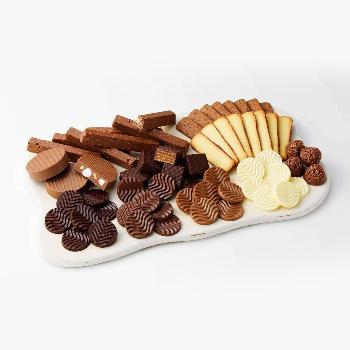ROYCE' Chocolate - ROYCE' Collection "Blue" - Image shows different kinds of confections in various shapes and colors, as arranged on a white wooden tray.