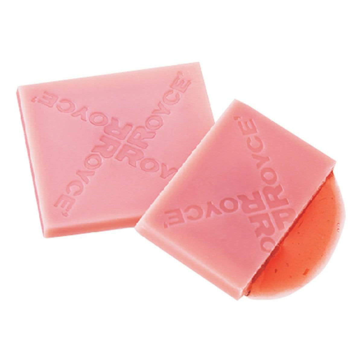 ROYCE' Chocolate - Prafeuille Chocolat "Sakura Cube" - Image shows pink chocolate squares filled with red sauce and engraved with the words "ROYCE'".