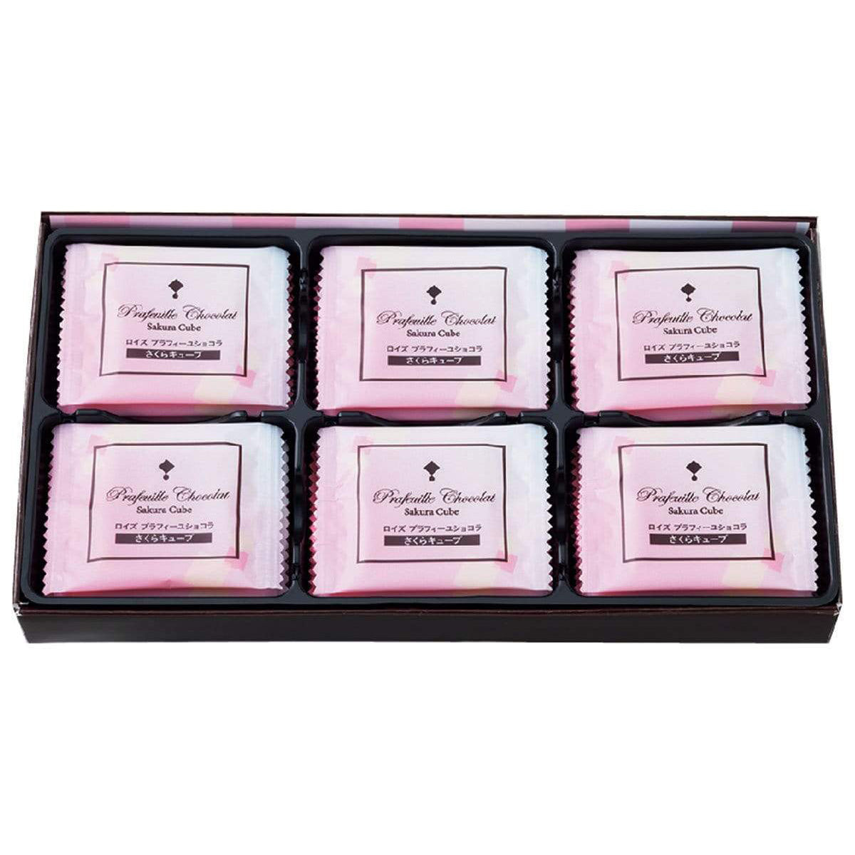 ROYCE' Chocolate - Prafeuille Chocolat "Sakura Cube" - Image shows a box filled with individually-wrapped chocolates with pink wrapping. Text says Prafeuille Chocolat Sakura Cube.
